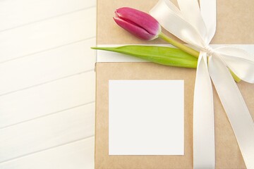 Square gift sticker mockup, blank adhesive label mock up for design presentation, Mother's day, 8 th of March concept.