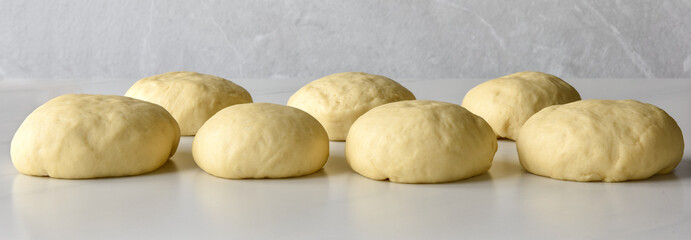 rwa rolls (dough) on board