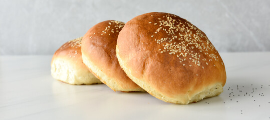 fresh baked buns with sesame and poppy  seeds