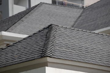 roof shingle background and texture. dark asphalt tiles on the roof. - obrazy, fototapety, plakaty