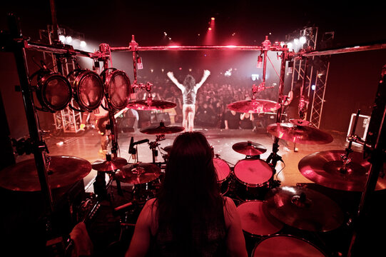 Rock band performing at concert