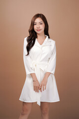 Asian woman, Business casual outfit, mocha background