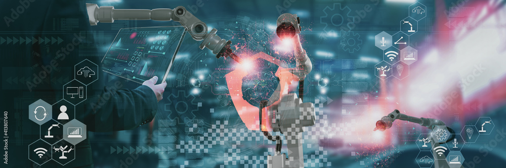Wall mural industry engineer in factory,using smart tablet glass device,control automated robot arm machine lea