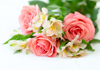 .Bouquet of flowers. Pink roses on white background. Postcard. Place for text