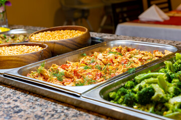 Open buffet full of delicious fruits with orange, grape, watermelon