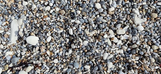 Pebbles on a beach. Lulworth Cove. Dorset in the United Kingdom. Jurassic Coast.