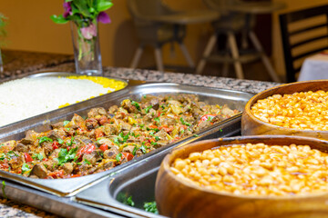 Open buffet full of delicious fruits with orange, grape, watermelon