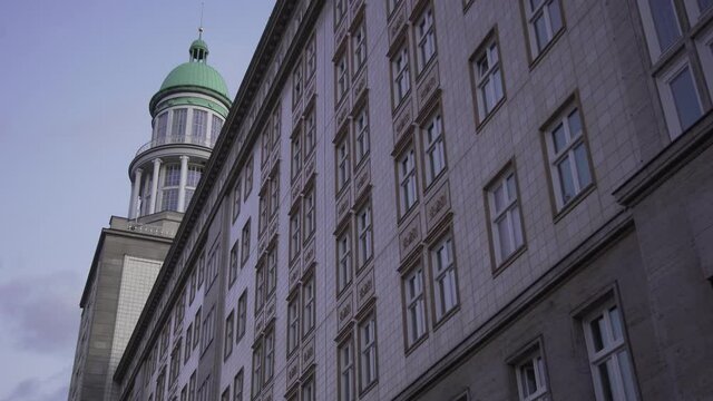 Static shot of Frankfurter Gate vintage building in Berlin during dusk, Germany