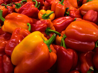 fresh raw sweet red bell peppers closeup