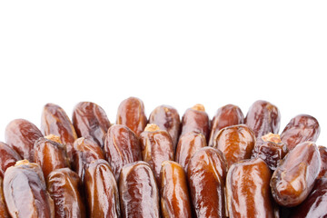 Creative layout made of dried dates. Flat lay. Food concept. Fruits dates. Dates Palm fruit isolated on white. Dried fruits. Healthy diet.