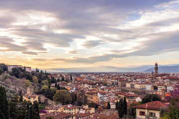 Panoramic view of Florence skyline at Sunset with famous Palazzo Vecchio and Ponte Vecchio. Tuscany, Italy