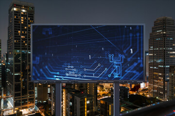 Fototapeta premium Information flow hologram on road billboard, night panorama city view of Bangkok. The largest technological center in Southeast Asia. The concept of programming science.