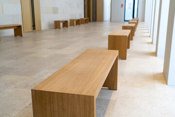 wooden benches inside building interior office