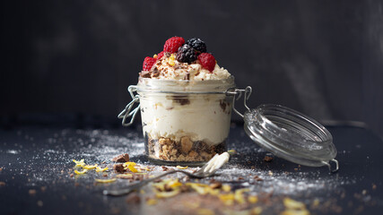 cheesecake in a jar, black background