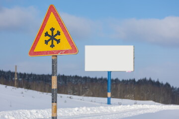 Road signs for drivers on the road, on a winter sunny day