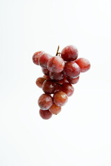 Red grape isolated on white