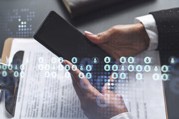 Businesswoman in formal wear checking the phone to sign the employment agreement to boost her career and gain new opportunities in personal growth. Concept of success. Social media hologram icons