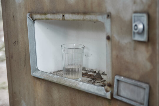 Broken refreshments drinks machines in overgrown ghost city Pripyat,