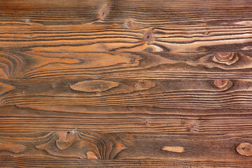 A fragment of a old wooden plank