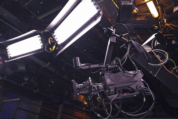 Camera jib and lighting equipment in broadcasting studio