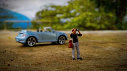 Obraz premium Car and Photographer