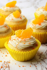 Orange cream cupcake with peel