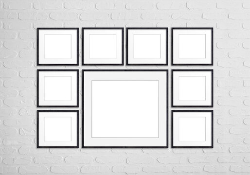 Photo frames set isolated on white bricks wall, nine black realistic  frameworks collection, 3d illustration, interior decor mock up
