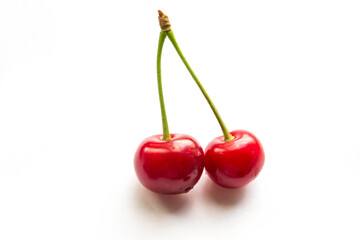 Fresh cherry fruit on white background.
