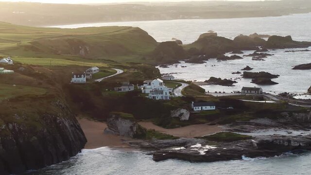 Ballintoy harbour is synonymous with Pyke and the Iron Islands.Theon is baptised here and Euron is drowned and reborn. The beach played host to Mellisandre's burning of Stannis Barratheon's bannerman