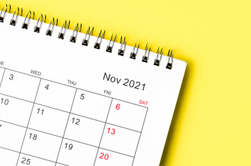 Close up November 2021 Calendar desk for organizer to plan and reminder.