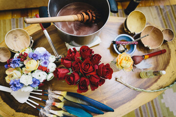 Table filled with an assortment of tools for cacao ceremony