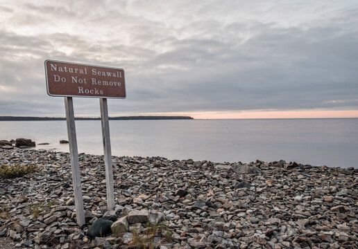 Sign reminding tourists not to remove rocks from shore, Acadia, Maine