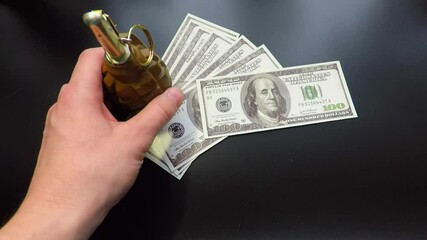 the black table dollars a grenade and a loaded pistol