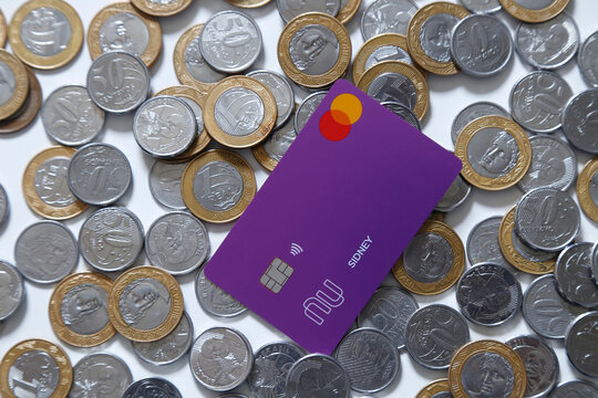Nubank logo on credit card. Digital payment system.