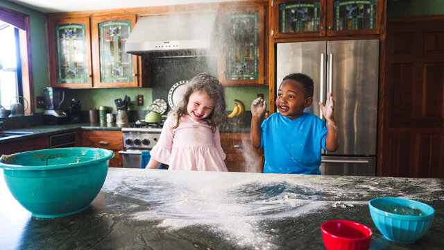 Kids making a messing the kitchen