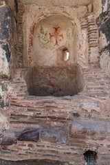 The baptistery cross painting after being vandalized at Beit She'an in Israel