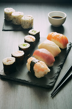 Sushi set sashimi rolls served