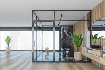 Dark marbel and wooden bathroom modern interior with a wooden floor, a black ceramic tub, a tree in a pot, panoramic window, double sink.