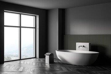 Obraz na płótnie Canvas Grey and green bathroom with white bathtub, parquet floor and window