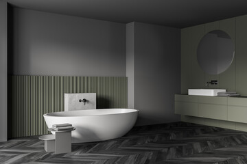 Naklejka na ściany i meble Grey and green bathroom with white bathtub, mirrors and parquet floor
