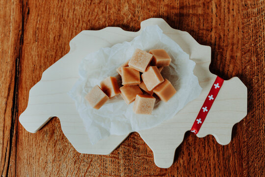 Swiss traditional milk caramel on the cutting board in the shape