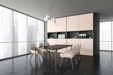 Black and wooden office room with table and chairs near window on parquet