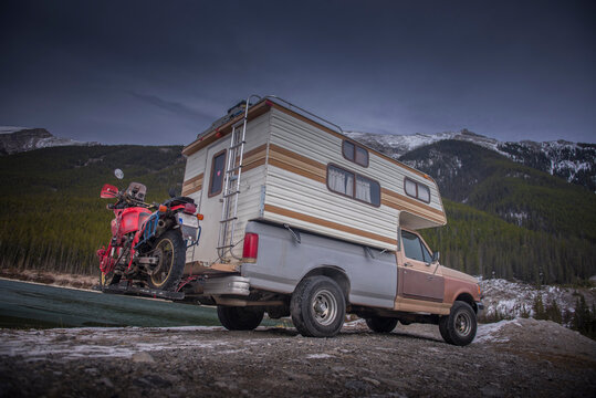 Camper Truck with Touring Motorcycle in Spray Lakes Reservoir