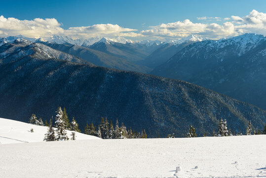 Snowy Mountain Range in Winter With Clouds