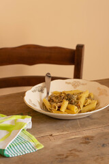Artichoke pasta with some bread on top