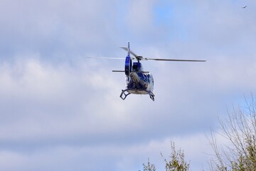 Medical helicopter with an injured patient headed to the hospital