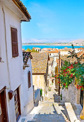 The narrow hilly street in old Nafplio, Greece