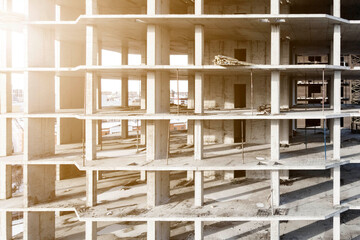 monolithic house at the stage of construction of a monolithic fill, photographed from a flying drone at sunset