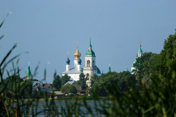 Fototapeta na wymiar View to Spaso-Yakovlevsky Dimitriev monastery from the shore of Lake Nero.