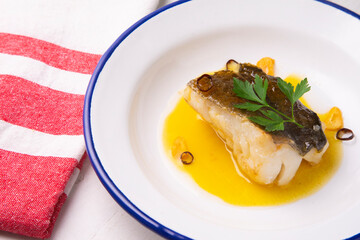 Bacalao al pil pil traditional recipe from Bilbao.